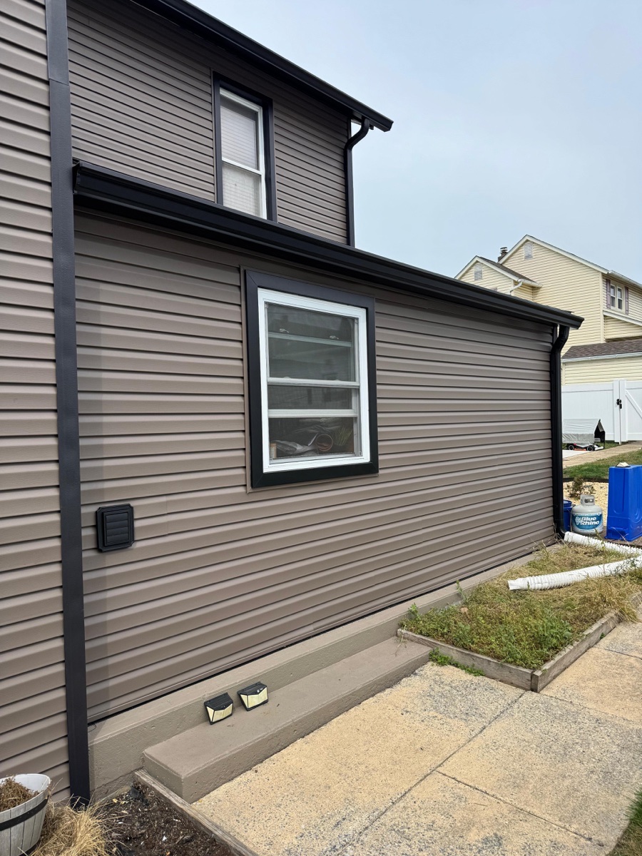 Black Gutter Installation Project